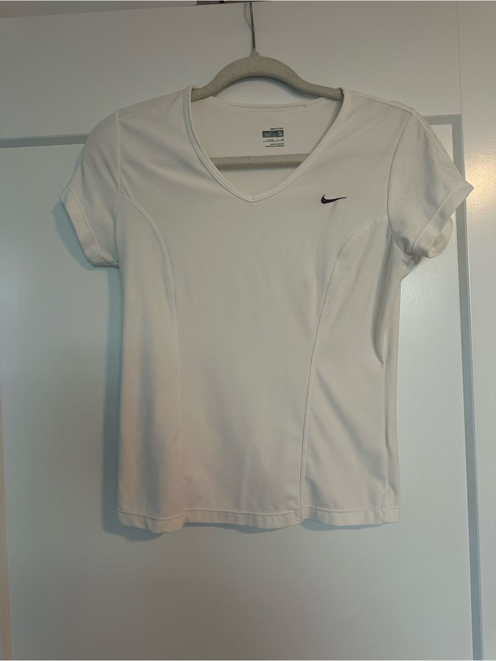Nike Women’s White V-Neck Short Sleeve Athletic Tee with Brown Swoosh